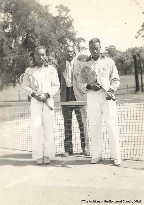 Two Tennis Players And Their Coach