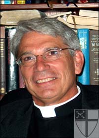 [The Very Rev. Mark J. Law...]