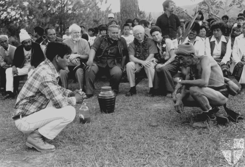 [The village elder (right)...]