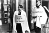 [thumbnail: Demonstrators, under the...]