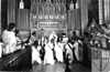 [thumbnail: Eleven women kneeling at...]