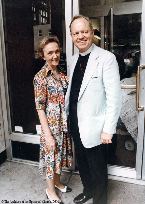 Allin And Ann Standing On Sidewalk