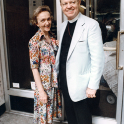 Allin And Ann Standing On Sidewalk